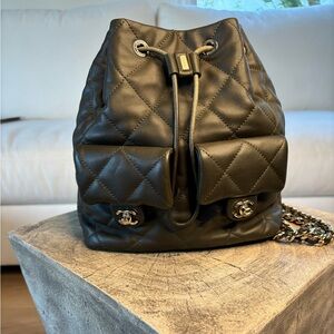 CHANEL Quilted Olive Green Drawstring Backpack with Front Pockets